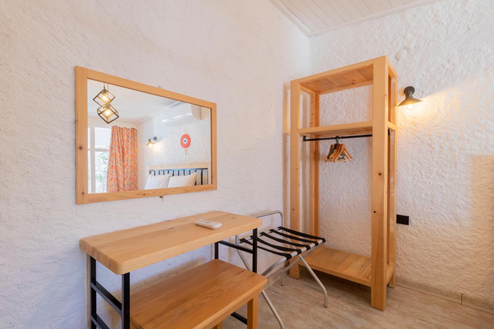 Alacati Gazde/Camere de închiriat *