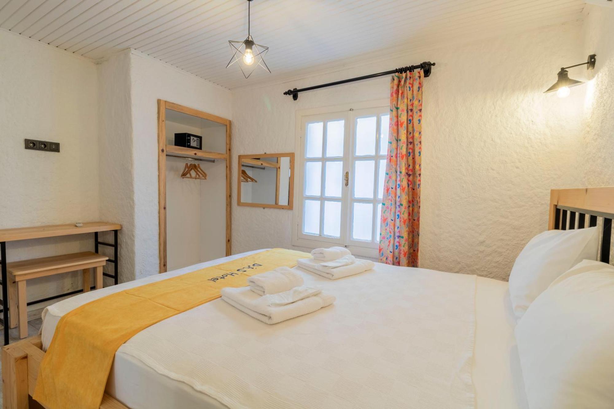 Alacati Gazde/Camere de închiriat *